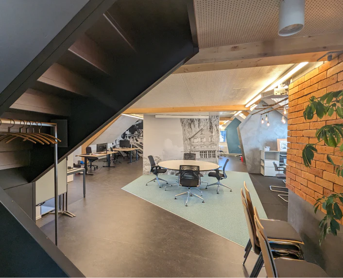 Hauptsitz Roggwil TG — Innenansicht, Open Floor mit Meeting-Bereich